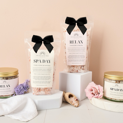 Spa products including bath salts, candles, and a loofah with 'Spa Day' and 'Relax' text on a neutral background.