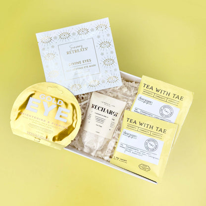 Packaged tea with visible branding on a yellow background