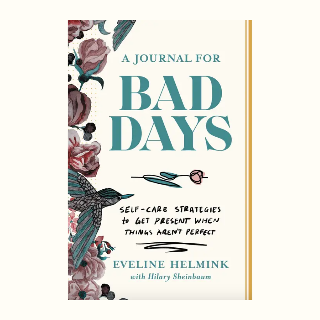 Book titled 'A Journal for Bad Days' with floral design on a white background