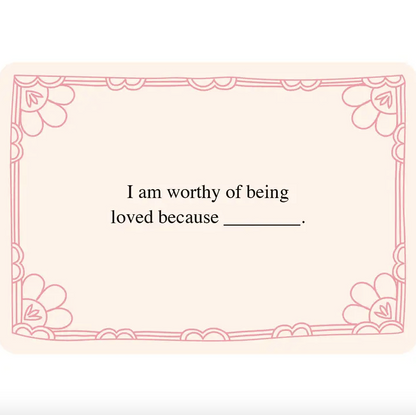 Blank card with decorative border and text 'I am worthy of being loved because _______' on a white background