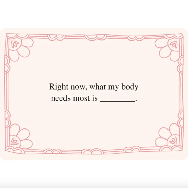 Blank card with decorative border and text prompt on a light pink background