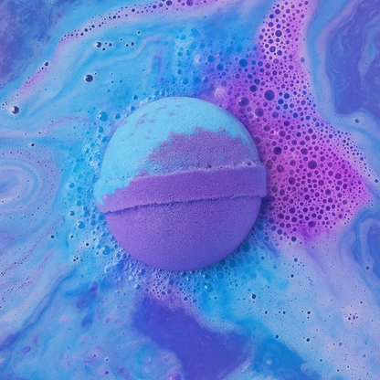 Purple bath bomb on a blue and purple marbled background