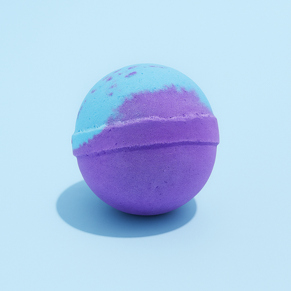 Two-toned purple and blue bath bomb on a light blue background