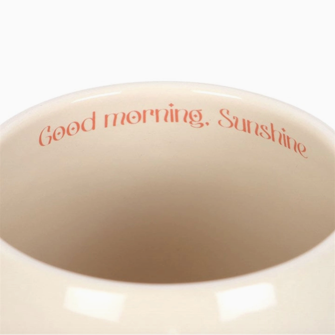 Beige bowl with 'Good morning, Sunshine' text in red on a white background