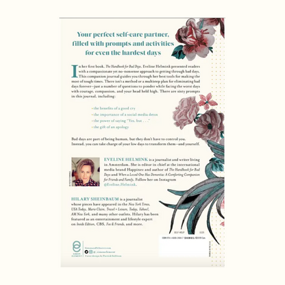 Book or journal with floral design and text on a white background