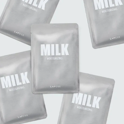 LAPCOS Milk Moisturizing face mask packets on a light gray background