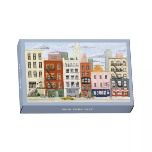 Puzzle Box with a New York City street scene illustration on a white background