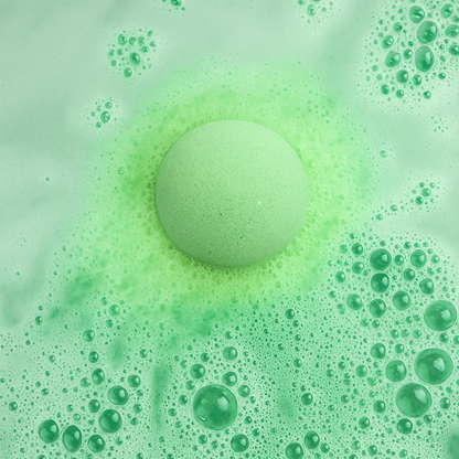 Close-up of a green sponge with bubbles on a green background