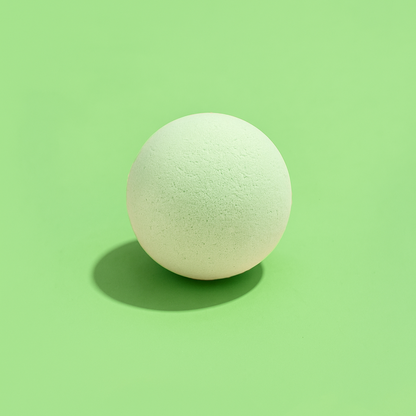 peppermint bath bomb on a green background